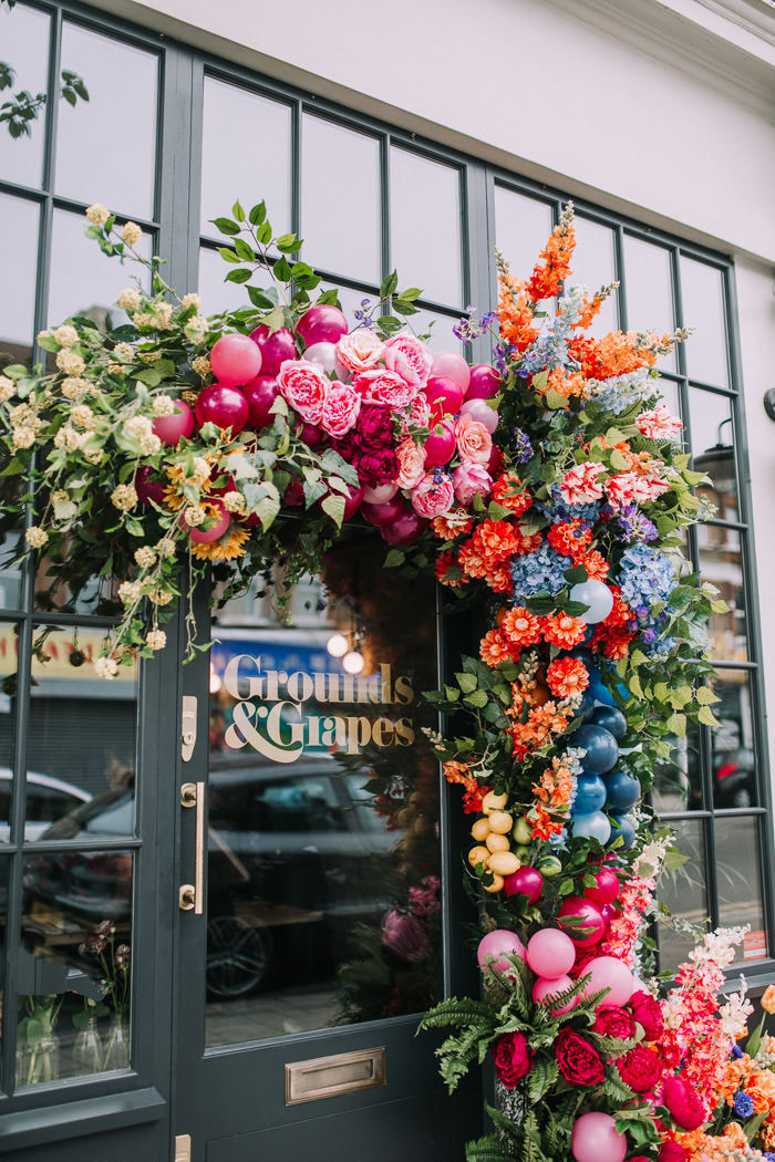 colourful florals, doors of london, early hours london, faux flowers, floral workshop, Grounds and Grapes, iconic london restuarants, influencers event, innovative london florist, london florist, mr and mrs Unique, press event, rainbow florals, shop fronts, spring flowers